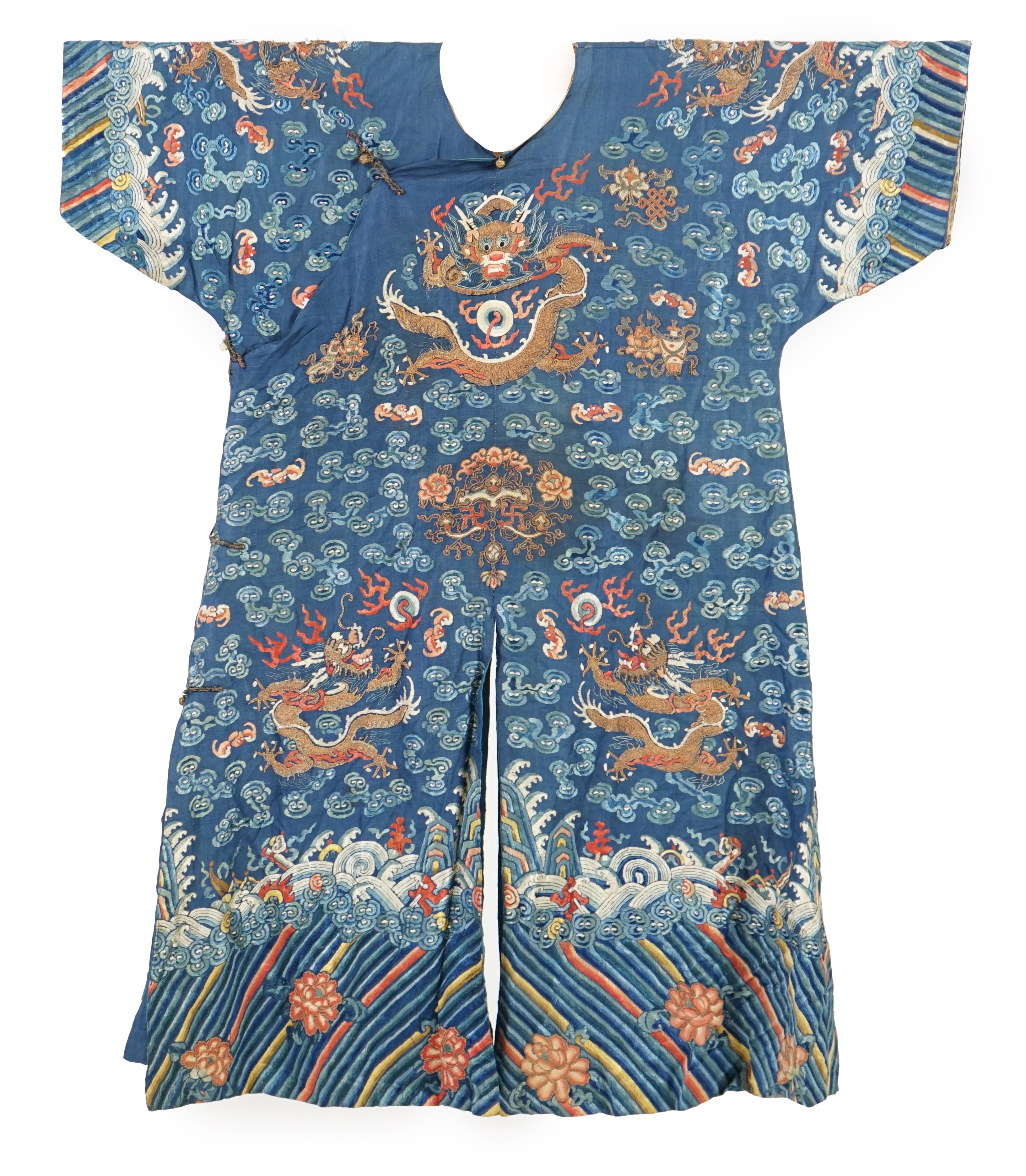 A Chinese blue silk ‘dragon’ robe, jifu, late 19th century and a mandarin hat